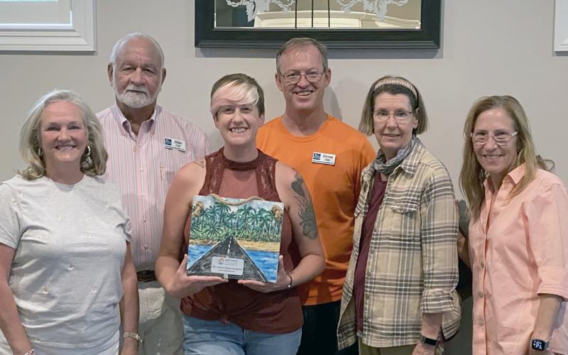 Keep Nassau Beautiful board members and staff celebrate their award, including Lynda Bell, Mike Cole, Jules Ruppel, Steven Gibb, Kelley McCarter and Jean Mauldin. 
