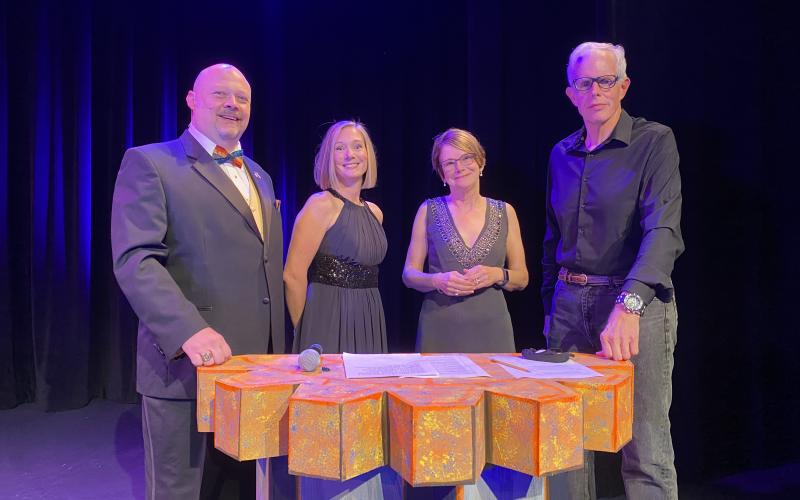 Nassau County Tax Collector John Drew, from left, was the master of ceremonies for the Take Stock in Children – Nassau County Home Grown Virtual Gala. He was joined by Executive Director Robin Lentz, board chairwoman Regina Lee and videographer Bob Eberle.